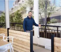  ?? JOEL CEAUSU, SPECIAL TO THE MONTREAL GAZETTE ?? Sales director Dax Giunta says the coursive or gangway at the rear of each Osha storey, shown above in a sales office display and at right in an artist’s rendering, lets neighbours mingle while still allowing them their privacy.