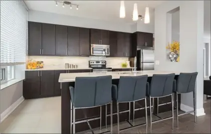  ??  ?? Step right into lavish apartment living with these luxury rental suites at The Cooperage North and South, and The Onyx North and South towers! Spectacula­r views of Urban Uptown living and Waterloo Park, centered in the most sought-after location in Waterloo!