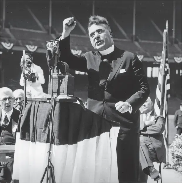  ?? FOTOSEARCH / GETTY IMAGES ?? Father Charles Coughlin delivers a radio speech, circa 1930s. The weekly broadcasts regularly included invective against Jews and praise for Hitler.