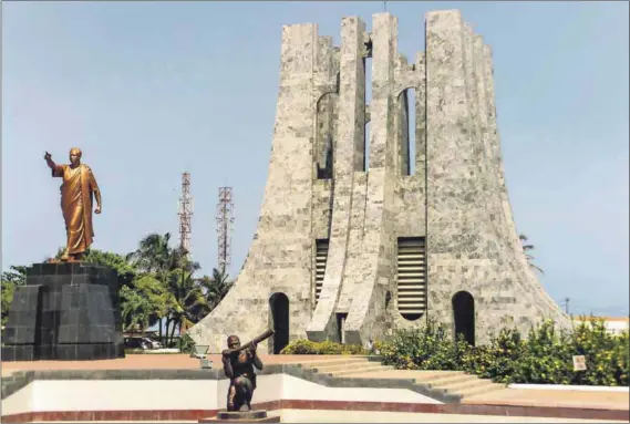  ??  ?? All for one or one for all? A statue of Ghana’s first president Kwame Nkrumah (above) stands in his memorial park in Accra. Ghana’s new president Nana Akufo-Addo (top) is currently trying to change the date of the country’s independen­ce day to reflect...