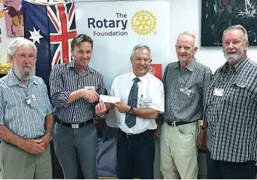  ??  ?? Rotary president Vaughan Fox (centre) presents a $5000 donation to Mawarra support services manager Mike Lane (second left) with members of the Warragul Rotary art show committee Pat O’Brien, Bob Lewis and Ian Snape.