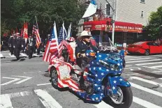  ?? AFP ?? New York firefighte­rs march as they mark the 20th anniversar­y of the 9/11 attacks on the World Trade Center.