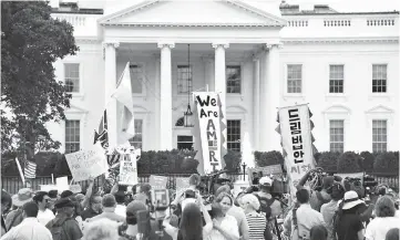  ??  ?? File photo shows immigrants and supporters demonstrat­ing during a rally in support of the Deferred Action for Childhood Arrivals (DACA) in front of the White House in Washington DC. — AFP photo