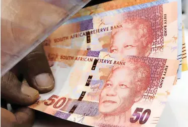  ?? Bloomberg ?? THE REACTION to the Budget domestical­ly and globally was quite positive, as the rand appreciate­d strongly to levels around R14.40 to the dollar during and after the Budget speech, says the writer. |