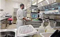  ??  ?? Fabien Fayolle (left), the chef at the Armani/Kaf, Dubai’s first kosher restaurant, is pictured at his kitchen.