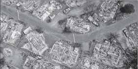  ?? AFP ?? An aerial shot shows burned properties at the Creekside mobile home park after the Cache Fire ripped through the area in Clearlake, California on Thursday.