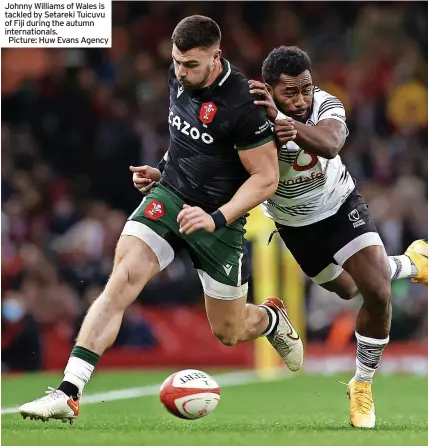  ?? ?? Johnny Williams of Wales is tackled by Setareki Tuicuvu of Fiji during the autumn internatio­nals.
Picture: Huw Evans Agency