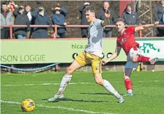  ?? ?? Grady Mcgrath, right, scores Brechin City’s first goal against Forres Mechanics at Glebe Park.