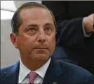  ?? ALEX WONG / GETTY IMAGES ?? U.S. Secretary of Health and Human Services Alex Azar listens during an Oval Office announceme­nt Sept. 11 at the White House.