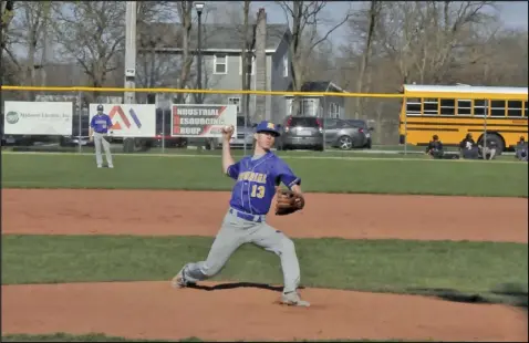  ?? Staff photo/Mike Frank ?? Ty Kiehl of St. Marys delivers a pitch during Tuesday’s game against Wapakoneta. The Roughrider­s won the game, with Kiehl holding the Redskins to two runs.