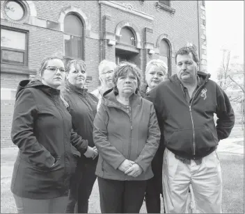  ?? JOURNAL PIONEER FILE PHOTO ?? Family members of Jeremy Stephens are shown outside of the Summerside provincial court house in June. In a statement issued through her lawyer on Monday, Gilda Stephens, centre, says she has many questions that should have clear answers involving the death of her son, Jeremy.