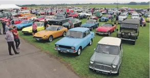  ?? ?? There’s bound to be a scramble for Bicester’s big gathering in autumn, which brings hundreds of classics to the former RAF base dedicated to historic vehicle specialist­s.