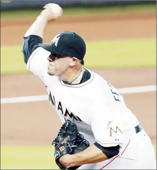  ??  ?? Miami Marlins’ Jose Fernandez pitches against the Philadelph­ia Phillies during the first inning of a baseball game
in Miami, April 13. The Marlins won 2-1. (AP)