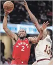  ?? TONY DEJAK THE ASSOCIATED PRESS ?? Toronto’s Kawhi Leonard drives to the basket against Cleveland’s Tristan Thompson on Saturday.