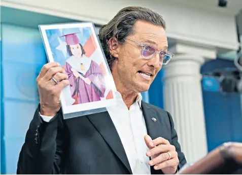  ?? ?? Matthew Mcconaughe­y holds an image of Alithia Ramirez, 10, who was shot dead at an elementary school in Uvalde, Texas, as he speaks during a press briefing at the White House