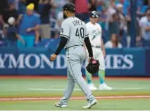  ?? CHRIS O’MEARA /AP ?? White Sox reliever Reynaldo Lopez walks off after giving up a two-run, gamewinnin­g home run to the Rays’ Brandon Lowe during the ninth inning on April 21 in St. Petersburg, Fla.