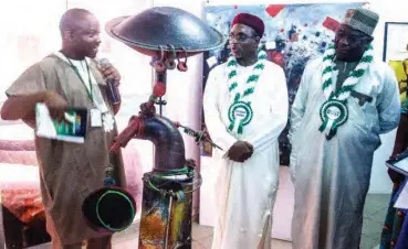  ??  ?? Dr. Gambo Duniya conducting dignitarie­s around the exhibition Kemi Akin-Nibosun