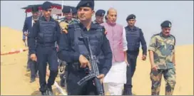  ?? HT PHOTO ?? Home minister Rajnath Singh with BSF IG, Rajasthan Frontier, Anil Paliwal (right) at an outpost.