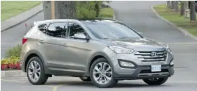  ?? HYUNDAI ?? The 2013 Hyundai Santa Fe looks better on the outside and has some strong features.