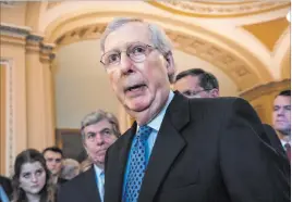  ?? J. Scott Applewhite The Associated Press ?? Senate Majority Leader Mitch Mcconnell, R-KY., joined by his GOP leadership team, answers questions during a news conference Tuesday at the Capitol.