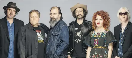  ??  ?? Steve Earle, third from left, lauds the Dukes — Brad Pemberton, left, Kelley Looney, Ricky Ray Jackson, Eleanor Whitmore and Chris Masterson — who can play music from any point in his career.