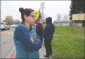  ??  ?? Parent Carrie Schiffer waits outside the school as Tokay High was placed on lockdown in Lodi on Tuesday.