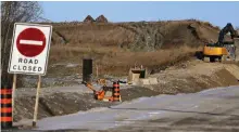  ?? CLIFFORD SKARSTEDT/ EXAMINER ?? Drain Brothers continue their work along Pioneer Rd. east of Nassau Mills Rd. on Friday at the Trent Research and Innovation Park site.