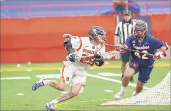 ?? Michael J. Okoniewski / Syracuse Athletics ?? Shaker graduate Stephen Rehfuss of the Syracuse men's lacrosse team leads the Orange with 12 goals, 13 assists and 25 points. He is 21st in the NCAA in points per game.
