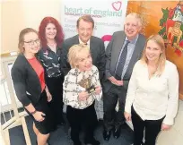  ??  ?? Tina Costello, CEO of Heart of England Community Foundation, with Wright Hassall staff