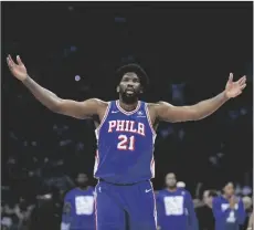  ?? AP PHOTO/MATT SLOCUM ?? Philadelph­ia 76ers’ Joel Embiid reacts during the first half of Game 6 in an NBA basketball first-round playo› series against the New York Knicks, on Thursday in Philadelph­ia.