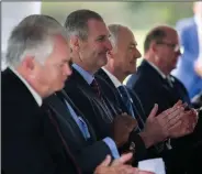  ?? (Arkansas Democrat-Gazette/Stephen Swofford) ?? Trex CEO Bryan Fairbanks (center, left) sits Tuesday with local officials, including Gov. Asa Hutchinson (center, right) during an announceme­nt about a new factory to be built in the Port of Little Rock.