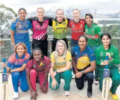  ?? AFP ?? Thailand’s Sornnarin Tippoch, front left, and captains of the other nine teams pose at Taronga Zoo in Sydney ahead of the Women’s T20 World Cup.