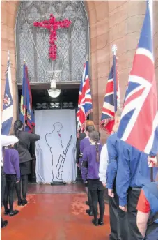  ??  ?? Remembranc­e service Uniformed organisati­ons at New St Andrew’s Church in Coatbridge on Remembranc­e Sunday