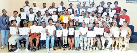  ?? Picture: SUPPLIED ?? WINNERS ALL: Members of Marselle United Sport Academy celebrate after an awards ceremony at Marselle Community Hall on Saturday November 18.