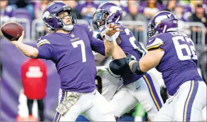  ?? AP PHOTO ?? Minnesota Vikings quarterbac­k Case Keenum throws a pass during an NFL game against the Los Angeles Rams in Minneapoli­s on Sunday.