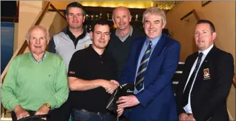  ??  ?? David Keating Club Profession­al (front third from left) presenting first prize in the David Keating Pro Shop Men’s competitio­n to winner Sean Moynihan with Tom Pendergast accepting 2nd prize for his grandson Ian, Declan McCarthy Captain (back) Mark...