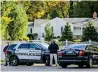  ?? AP ?? Police officers stand in front of property owned by Hillary and Bill Clinton in Chappaqua, New York, on Wednesday. —