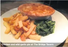  ??  ?? Chicken and wild garlic pie at The Bridge Tavern