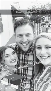  ?? Ann Beverly ?? PARKER BEVERLY, center, with Kellie Naples, left, and sister Lauren in a selfie with his geofilter.