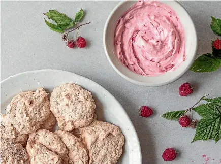  ?? NICOLA GALLOWAY ?? A tart raspberry labneh creme spread between sweet hazelnut meringues are a delightful combinatio­n.