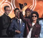  ?? USA TODAY ?? “These songs were written with nothing but joy,” said Bruno Mars, who won six trophies Sunday.