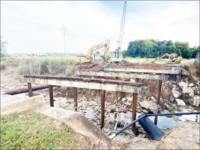  ??  ?? The bridge on Old West Point Road was removed last Tuesday as Phillips Contractin­g prepares to begin replacemen­t. (Photo by Cal Brown, SDN)