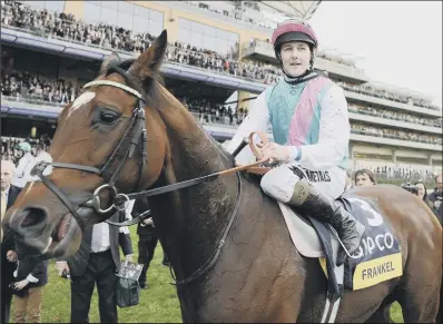  ?? PICTURE: ALAN CROWHURST/GETTY IMAGES ?? WINNING COMBINATIO­N: Tom Queally on board Frankel after a win at Ascot in 2012.