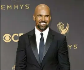  ?? PHOTO BY RICHARD SHOTWELL — INVISION — AP, FILE ?? Shemar Moore arrives at the 69th Primetime Emmy Awards in Los Angeles. Moore stars in the new crime drama “S.W.A.T.” premiering Thursday on CBS.