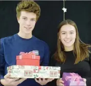  ?? MELANIE EKSAL/Penticton Herald ?? Pen-Hi leadership students Matthew MacDonald and Katie Foreman are organizing this year’s Toys for Tots to Teens on Thursday and offering a fresh spin on the event that includes breakfast and live entertainm­ent.
