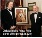  ?? ?? Christian giving Prince Philip a print of the portrait in 2010