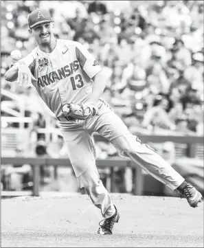  ?? Craven WHITLOW/NATE allen Sports Service ?? Arkansas freshman starter Connor Noland makes a play in a 5-4 loss to Texas Tech Monday at TD Ameritrade Field in Omaha, Nebraska. The loss eliminates the Hogs from the College World Series.