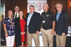  ?? NWA Democrat-Gazette/CARIN SCHOPPMEYE­R ?? Rhonda Wotowis (from left); Patrick Skinner; Martine Pollard; Dr. Brian Mahaffey, St. Louis Cardinals team physician; Dick Rippee; and Dr. Steve Goss, president, Mercy Clinic Northwest Arkansas, gather at the Beat the Heat luncheon.