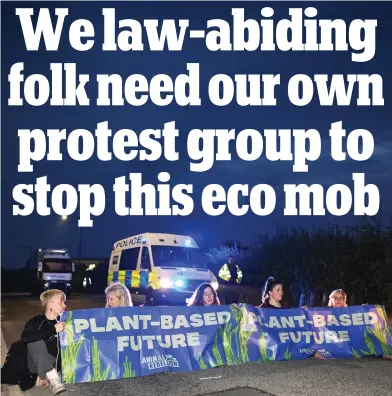  ?? ?? Blockheads: Animal Rebellion activists at the entrance to Arla’s Aylesbury plant on Sunday