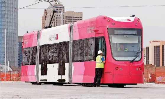  ?? [PHOTO BY STEVE SISNEY, THE OKLAHOMAN] ?? Oklahoma City’s streetcar No. 1 underwent tests Friday on the Hudson Avenue track near the downtown maintenanc­e facility. Oklahoma City is buying seven Brookville Liberty model streetcars. Two have been delivered so far; the third is due Monday.